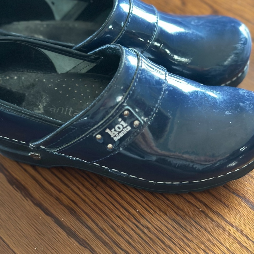 Koi by Sanita Blue Patent Leather Clogs